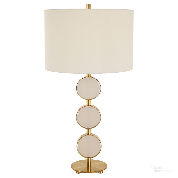 The appearance of Three Rings Table Lamp In Gold designed by Uttermost in the  interior design. This gold piece of furniture  was selected by 1StopBedrooms from Three Rings Collection to add a touch of cosiness and style into your home. Sku: 30202-1. Material: Metal. Product Type: Table Lamp. Image1