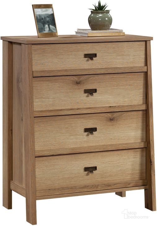 The appearance of Trestle 4-Drawer Chest In Timber Oak designed by Sauder in the modern / contemporary interior design. This timber oak piece of furniture  was selected by 1StopBedrooms from Trestle Collection to add a touch of cosiness and style into your home. Sku: 433918. Product Type: Chest. Material: Engineered Wood. Image1