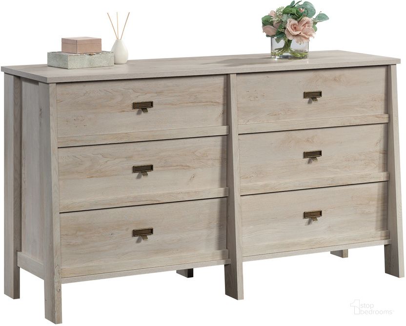 The appearance of Trestle Dresser In Chalked Chestnut designed by Sauder in the modern / contemporary interior design. This chalked chestnut piece of furniture  was selected by 1StopBedrooms from Trestle Collection to add a touch of cosiness and style into your home. Sku: 433923. Product Type: Dresser. Material: Engineered Wood. Image1