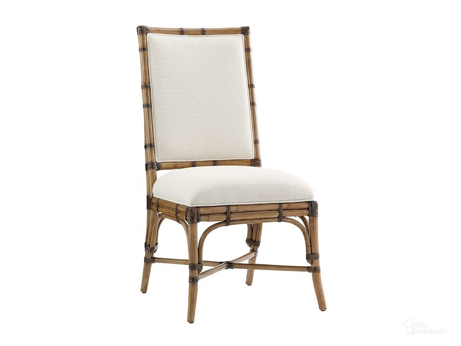 The appearance of Twin Palms Summer Isle Upholstered Side Chair designed by Tommy Bahama in the cabin / lodge interior design. This beige piece of furniture  was selected by 1StopBedrooms from Twin Palms Collection to add a touch of cosiness and style into your home. Sku: 01-0558-882-01. Material: Wood. Product Type: Side Chair. Image1