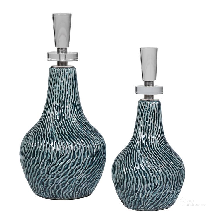 The appearance of Uttermost Almera Dark Teal Bottles Set Of 2 designed by Uttermost in the transitional interior design. This dark teal piece of furniture  was selected by 1StopBedrooms from Almera Collection to add a touch of cosiness and style into your home. Sku: 17842. Product Type: Decorative Accessory. Material: Iron. Image1