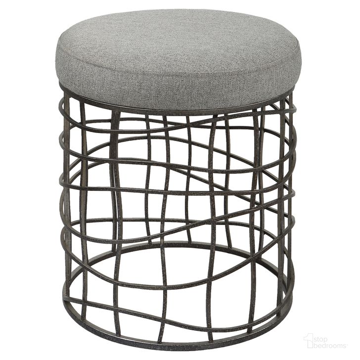 The appearance of Uttermost Carnival Iron Round Accent Stool designed by Uttermost in the modern / contemporary interior design. This silver piece of furniture  was selected by 1StopBedrooms from Carnival Collection to add a touch of cosiness and style into your home. Sku: 23748. Product Type: Accent Stool. Material: Iron. Image1