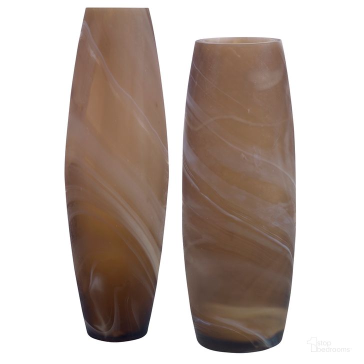 The appearance of Uttermost Delicate Swirl Caramel Glass Vases Set Of 2 designed by Uttermost in the modern / contemporary interior design. This caramel brown piece of furniture  was selected by 1StopBedrooms from Delicate Swirl Collection to add a touch of cosiness and style into your home. Sku: 18069. Material: Glass. Product Type: Decorative Accessory. Image1