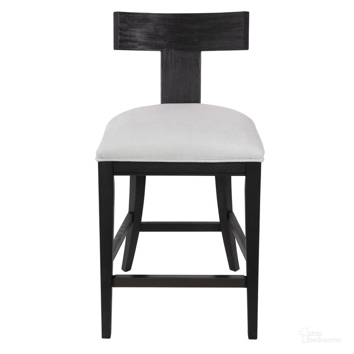 The appearance of Uttermost Idris Modern Wood Counter Stool designed by Uttermost in the modern / contemporary interior design. This black piece of furniture  was selected by 1StopBedrooms from Idris Collection to add a touch of cosiness and style into your home. Sku: 23664. Material: Wood. Product Type: Barstool. Image1