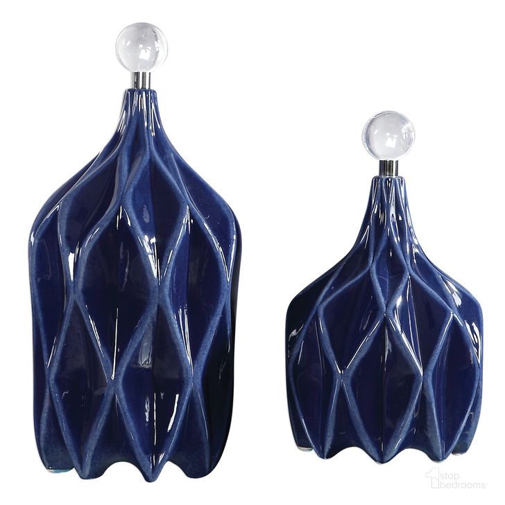 The appearance of Uttermost Klara Geometric Bottles Set Of 2 designed by Uttermost in the modern / contemporary interior design. This blue piece of furniture  was selected by 1StopBedrooms from Klara Collection to add a touch of cosiness and style into your home. Sku: 17526. Product Type: Decorative Accessory. Material: Stainless Steel. Image1