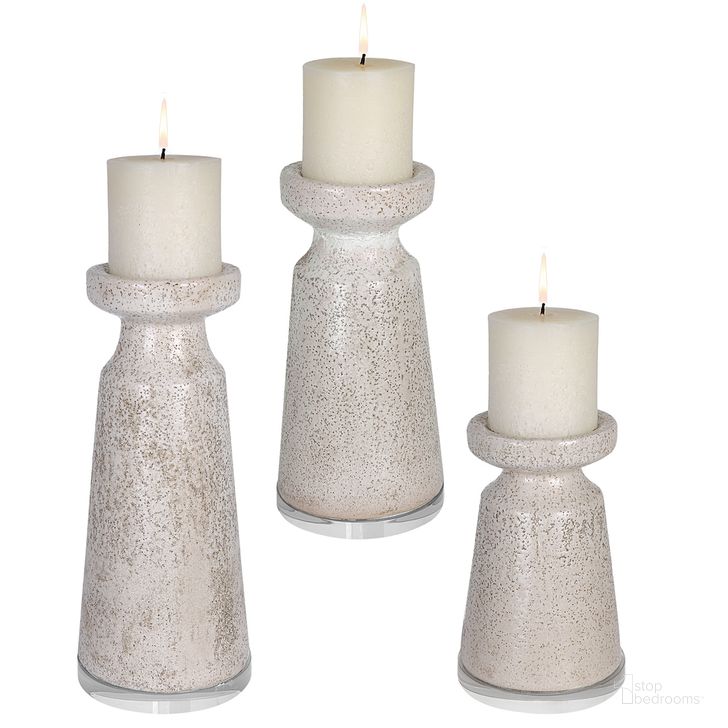 The appearance of Uttermost Kyan Ceramic Candleholders Set Of 3 designed by Uttermost in the transitional interior design. This white piece of furniture  was selected by 1StopBedrooms from Kyan Collection to add a touch of cosiness and style into your home. Sku: 17966. Product Type: Candle Holder. Material: Ceramic. Image1