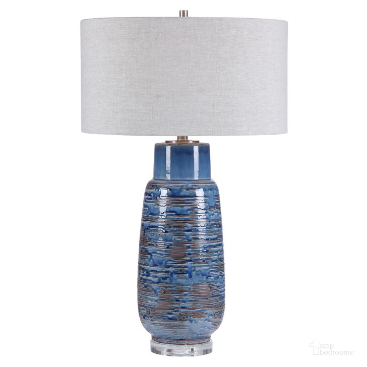 The appearance of Uttermost Magellan Blue Table Lamp designed by Uttermost in the modern / contemporary interior design. This blue piece of furniture  was selected by 1StopBedrooms from Magellan Collection to add a touch of cosiness and style into your home. Sku: 28276. Product Type: Table Lamp. Material: Iron. Image1
