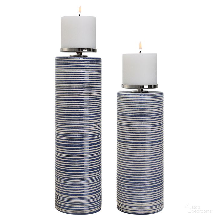 The appearance of Uttermost Montauk Ceramic Candleholders Set Of 2 designed by Uttermost in the modern / contemporary interior design. This blue piece of furniture  was selected by 1StopBedrooms from Montauk Collection to add a touch of cosiness and style into your home. Sku: 17998. Product Type: Candle Holder. Material: Iron. Image1