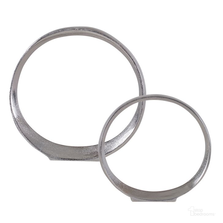 The appearance of Uttermost Orbits Nickel Ring Sculptures Set Of 2 designed by Uttermost in the modern / contemporary interior design. This nickel piece of furniture  was selected by 1StopBedrooms from Orbits Collection to add a touch of cosiness and style into your home. Sku: 17985. Material: Aluminum. Product Type: Sculpture. Image1