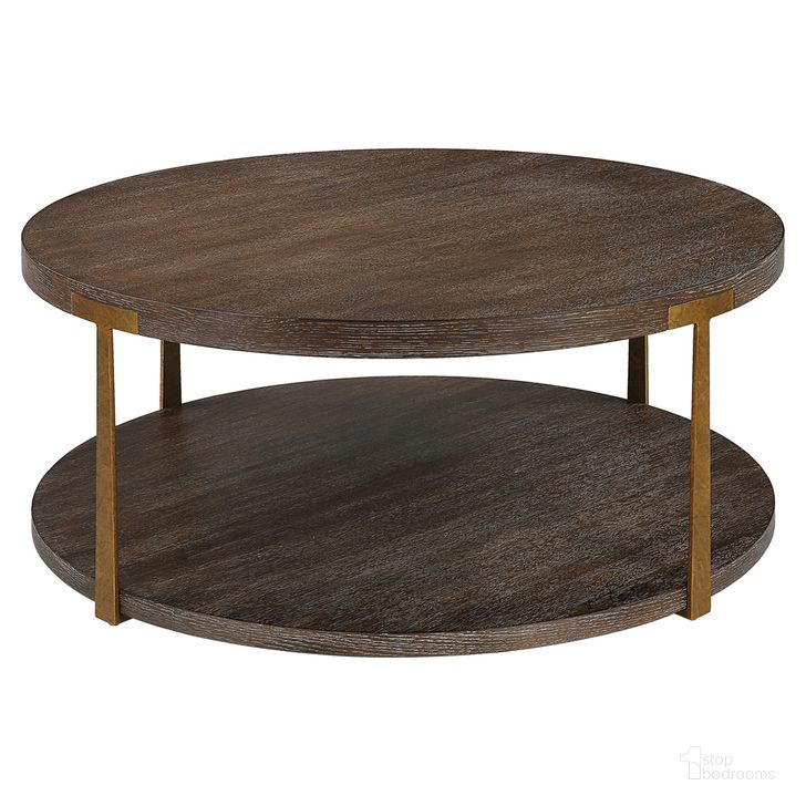 The appearance of Uttermost Palisade Round Wood Coffee Table designed by Uttermost in the modern / contemporary interior design. This antique gold piece of furniture  was selected by 1StopBedrooms from Palisade Collection to add a touch of cosiness and style into your home. Sku: 25555. Product Type: Coffee Table. Material: MDF. Image1