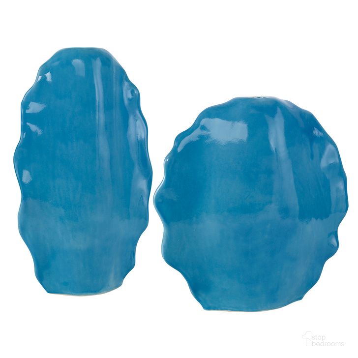 The appearance of Uttermost Ruffled Feathers Blue Vases Set Of 2 designed by Uttermost in the modern / contemporary interior design. This blue piece of furniture  was selected by 1StopBedrooms from Ruffled Feathers Collection to add a touch of cosiness and style into your home. Sku: 18051. Product Type: Decorative Accessory. Image1