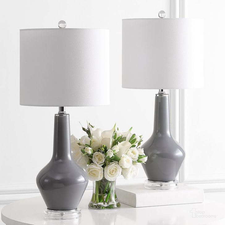 The appearance of Velor Smoked Gray Glass Table Lamp Set of 2 designed by Safavieh in the modern / contemporary interior design. This smoke gray piece of furniture  was selected by 1StopBedrooms from Velor Collection to add a touch of cosiness and style into your home. Sku: TBL4220A-SET2. Material: Chrome. Product Type: Table Lamp. Image1