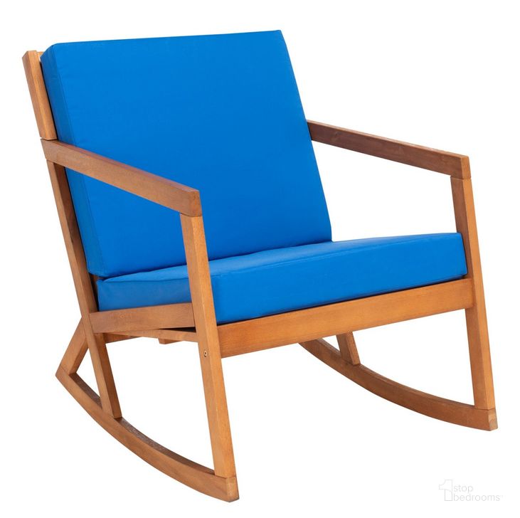 The appearance of Vernon Rocking Chair in Royal Blue designed by Safavieh in the modern / contemporary interior design. This royal blue piece of furniture  was selected by 1StopBedrooms from Vernon Collection to add a touch of cosiness and style into your home. Sku: PAT7013K. Material: Wood. Product Type: Outdoor Chair. Image1