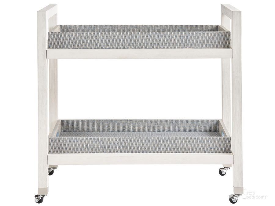 The appearance of Weekender Jupiter Bar Cart In White and Blue designed by Universal in the modern / contemporary interior design. This white and blue piece of furniture  was selected by 1StopBedrooms from Weekender Collection to add a touch of cosiness and style into your home. Sku: U330A890. Material: Metal. Product Type: Bar Cart. Image1