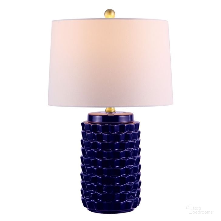 The appearance of Weldon Ceramic Table Lamp in Navy designed by Safavieh in the modern / contemporary interior design. This navy piece of furniture  was selected by 1StopBedrooms from Weldon Collection to add a touch of cosiness and style into your home. Sku: TBL4275A. Material: Ceramic. Product Type: Table Lamp. Image1