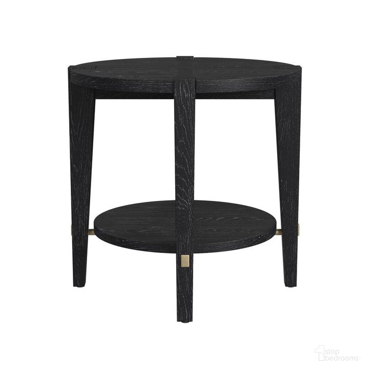 The appearance of Whitfield Round End Table In Black designed by Bassett Mirror Company in the modern / contemporary interior design. This black piece of furniture  was selected by 1StopBedrooms from Whitfield Collection to add a touch of cosiness and style into your home. Sku: 9985-LR-220. Material: Wood. Product Type: End Table. Image1