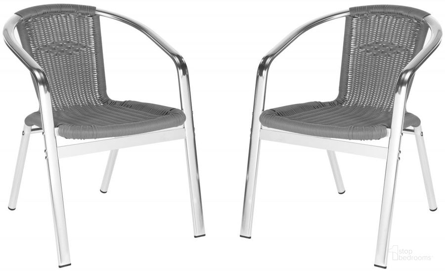 The appearance of Wrangell Gray Indoor/Outdoor Stacking Arm Chair Set of 2 FOX5207C designed by Safavieh in the modern / contemporary interior design. This grey piece of furniture  was selected by 1StopBedrooms from Wrangell Collection to add a touch of cosiness and style into your home. Sku: FOX5207C-SET2. Material: Aluminum. Product Type: Arm Chair. Image1