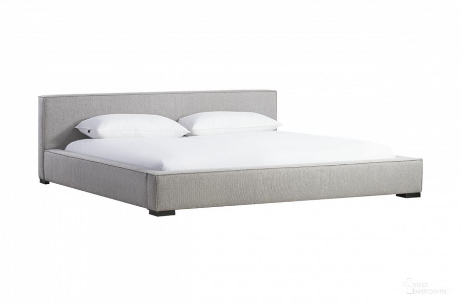 The appearance of Zest King Wide Upholstered Bed In Light Grey designed by Caracole in the modern / contemporary interior design. This light grey piece of furniture  was selected by 1StopBedrooms from Zest Collection to add a touch of cosiness and style into your home. Sku: MI03-5024-016. Bed Size: King. Product Type: Upholstered Bed. Material: Rubberwood. Image1