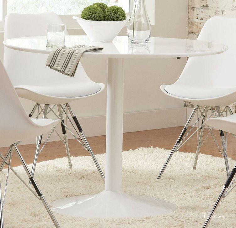 The appearance of Lowry White Dining Table designed by Coaster in the modern / contemporary interior design. This white piece of furniture  was selected by 1StopBedrooms from Lowry Collection to add a touch of cosiness and style into your home. Sku: 105261. Table Base Style: Pedestal. Table Top Shape: Round. Material: Metal. Product Type: Dining Table. Image1