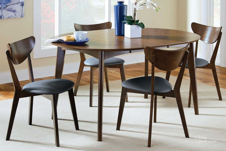 The appearance of Malone Round Extendable Dining Room Set designed by Coaster in the modern / contemporary interior design. This brown piece of furniture  was selected by 1StopBedrooms from Malone Collection to add a touch of cosiness and style into your home. Sku: 105361;105362. Table Base Style: Legs. Table Top Shape: Round. Material: Wood. Product Type: Dining Room Set. Image1
