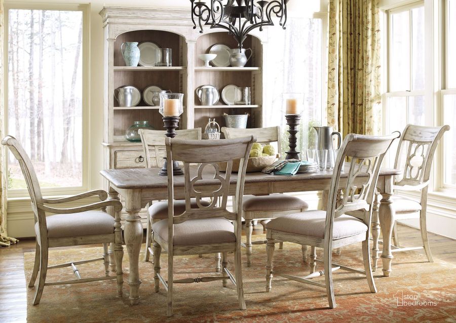 The appearance of Weatherford Cornsilk Canterbury Extendable Rectangular Dining Room Set designed by Kincaid in the transitional interior design. This cream piece of furniture  was selected by 1StopBedrooms from Weatherford Collection to add a touch of cosiness and style into your home. Sku: 75-054;75-065. Table Base Style: Legs. Material: Wood. Product Type: Dining Room Set. Table Top Shape: Rectangular. Image1