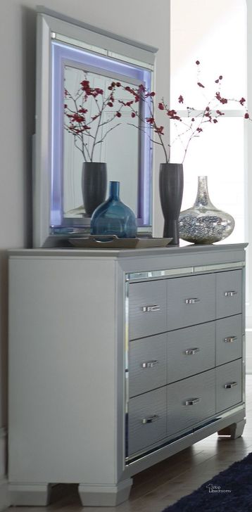 The appearance of Allura Silver Mirror designed by Homelegance in the modern / contemporary interior design. This silver piece of furniture  was selected by 1StopBedrooms from Allura Collection to add a touch of cosiness and style into your home. Sku: 1916-6. Material: Glass. Product Type: Dresser Mirror. Image1