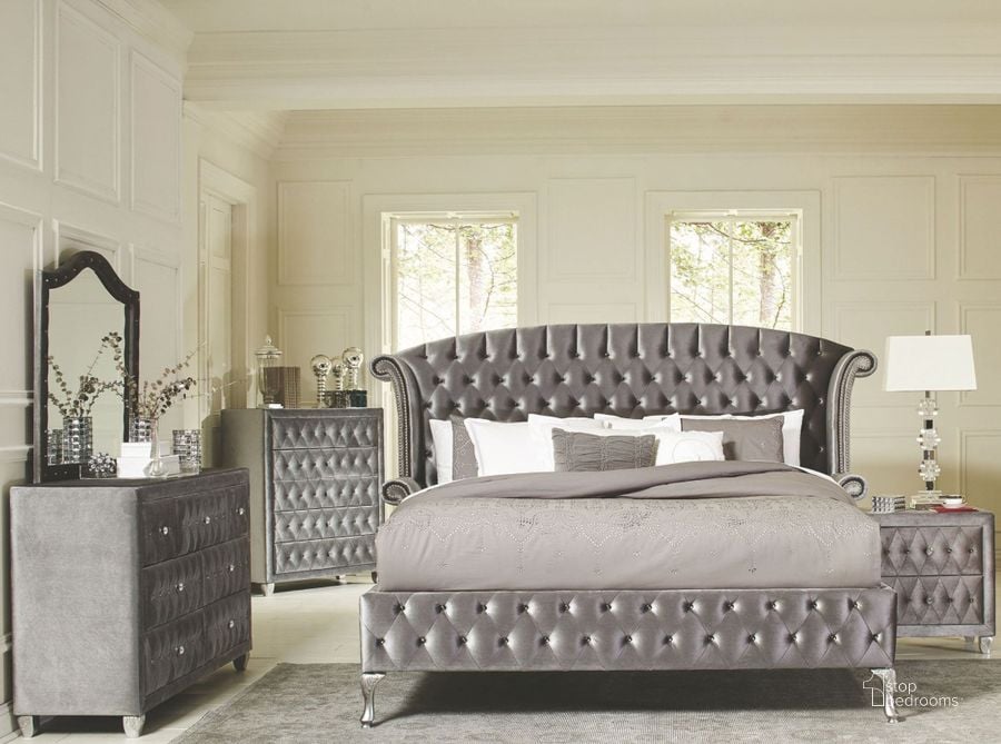 The appearance of Deanna Grey Upholstered Platform Bedroom Set designed by Coaster in the modern / contemporary interior design. This gray piece of furniture  was selected by 1StopBedrooms from Deanna Collection to add a touch of cosiness and style into your home. Sku: 205101QB1;205101QB2;205101QB3;205102. Bed Type: Platform Bed. Material: Fabric. Product Type: Platform Bed. Bed Size: Queen. Image1