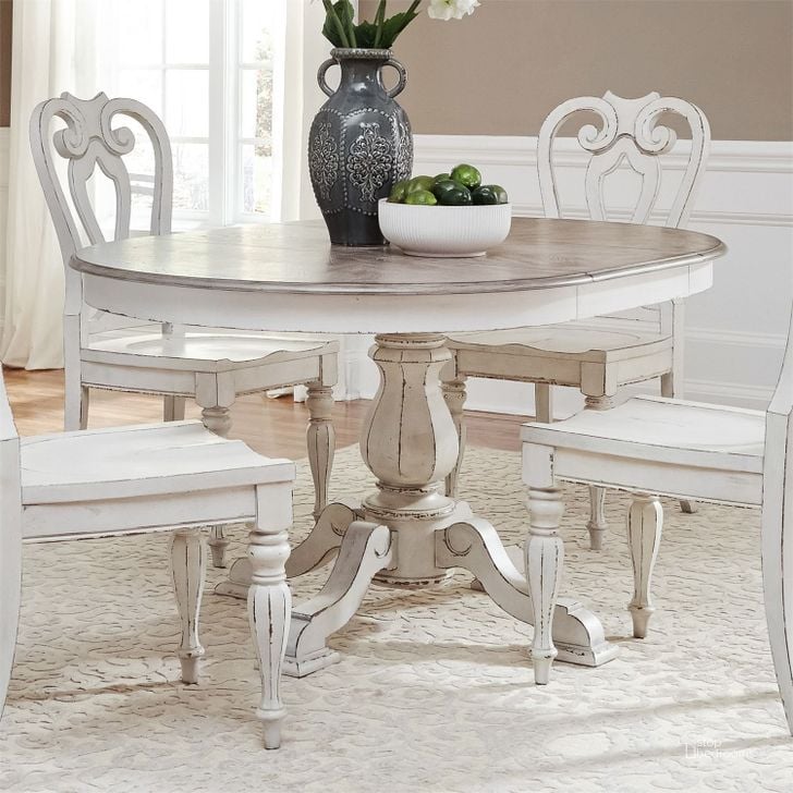 The appearance of Magnolia Manor Antique White Extendable Dining Room Set designed by Liberty in the transitional interior design. This antique white piece of furniture  was selected by 1StopBedrooms from Magnolia Manor Collection to add a touch of cosiness and style into your home. Sku: 244-T4260;244-P4260;244-C2500S. Table Base Style: Pedestal. Table Top Shape: Round. Material: Wood. Product Type: Dining Room Set. Image1