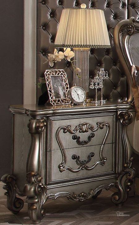 The appearance of Versailles Antique Platinum Nightstand designed by ACME in the rustic / southwestern interior design. This silver piece of furniture  was selected by 1StopBedrooms from Versailles Collection to add a touch of cosiness and style into your home. Sku: 26843. Material: Wood. Product Type: Nightstand. Image1
