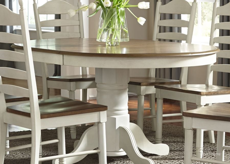 The appearance of Springfield Honey and Cream Extendable Pedestal Dining Room Set designed by Liberty in the transitional interior design. This white piece of furniture  was selected by 1StopBedrooms from Springfield Collection to add a touch of cosiness and style into your home. Sku: 278-P4260;278-T4260;278-C2000S. Table Top Shape: Oval. Material: Wood. Product Type: Dining Room Set. Image1