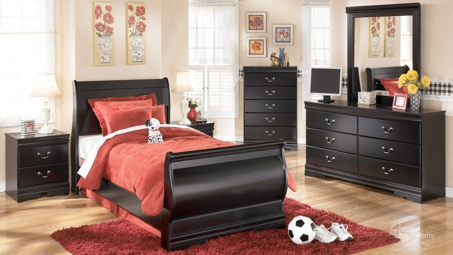 The appearance of Huey Vineyard Bedroom Set designed by Signature Design by Ashley in the transitional interior design. This black piece of furniture  was selected by 1StopBedrooms from Huey Collection to add a touch of cosiness and style into your home. Sku: B128-77;B128-74;B128-98;B128-92. Bed Type: Sleigh Bed. Material: Wood. Product Type: Sleigh Bed. Bed Size: Queen. Image1