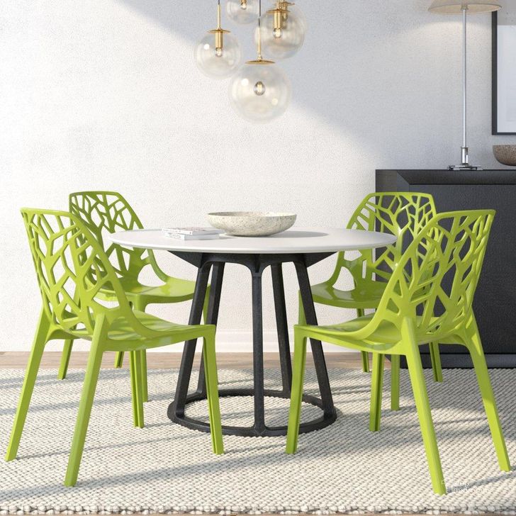 The appearance of 4 LeisureMod Cornelia Solid Green Dining Chairs designed by LeisureMod in the modern / contemporary interior design. This green piece of furniture  was selected by 1StopBedrooms from Cornelia Collection to add a touch of cosiness and style into your home. Sku: C18SG4. Product Type: Dining Chair. Material: Plastic. Image1