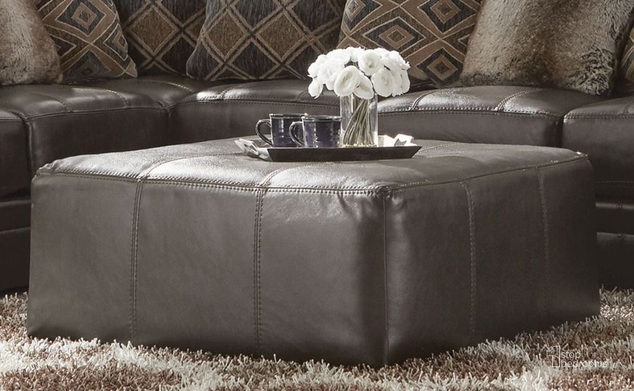 The appearance of Denali Steel Cocktail 40" Ottoman designed by Jackson in the transitional interior design. This gray piece of furniture  was selected by 1StopBedrooms from Denali Collection to add a touch of cosiness and style into your home. Sku: 437812128328308328. Product Type: Ottoman. Material: Vinyl. Image1