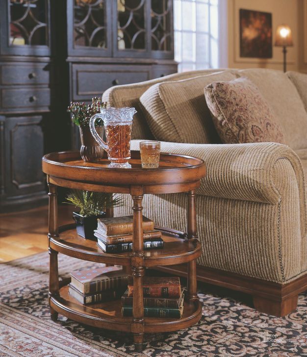 The appearance of Medium Wood Oval Accent Table designed by Hooker in the transitional interior design. This brown piece of furniture  was selected by 1StopBedrooms from Medium Collection to add a touch of cosiness and style into your home. Sku: 500-50-590. Material: Wood. Product Type: Accent Table.