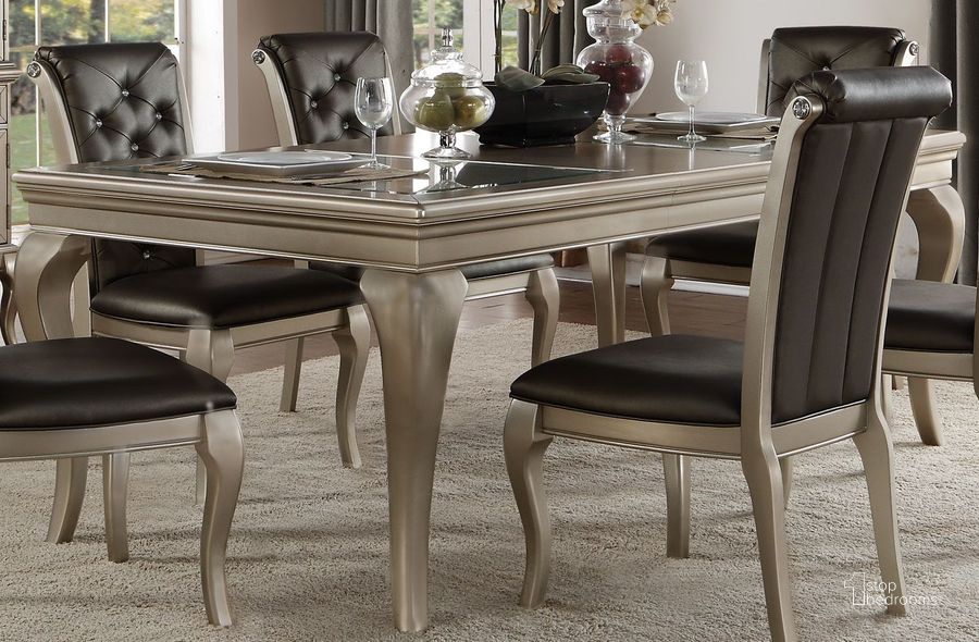 The appearance of Crawford Silver Extendable Dining Table designed by Homelegance in the traditional interior design. This silver piece of furniture  was selected by 1StopBedrooms from Crawford Collection to add a touch of cosiness and style into your home. Sku: 5546-84. Table Base Style: Legs. Material: Wood. Product Type: Dining Table. Table Top Shape: Rectangular. Image1