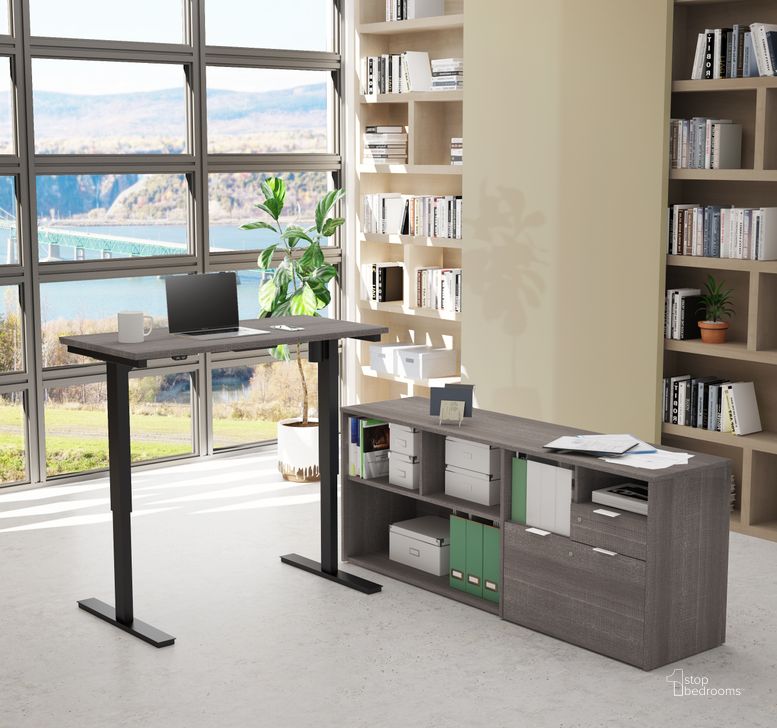 The appearance of I3 Plus Height Adjustable L-Desk In Bark Gray designed by Bestar in the modern / contemporary interior design. This bark gray piece of furniture  was selected by 1StopBedrooms from I3 Plus Collection to add a touch of cosiness and style into your home. Sku: 160885-47. Material: Wood. Product Type: Adjustable Table. Image1