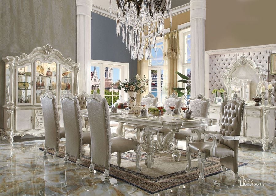 The appearance of Versailles Bone White 120" Extendable Dining Room Set designed by ACME in the rustic / southwestern interior design. This white piece of furniture  was selected by 1StopBedrooms from Versailles Collection to add a touch of cosiness and style into your home. Sku: 61130T;61131ST;61132. Table Base Style: Trestle. Material: Wood. Product Type: Dining Room Set. Table Top Shape: Rectangular. Image1