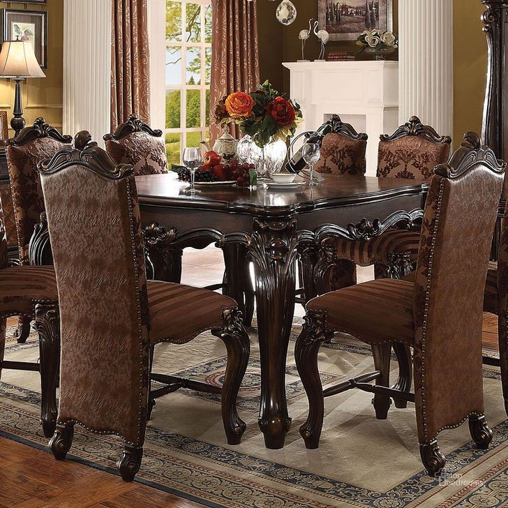 The appearance of Versailles Counter Height Dining Room Set (Cherry Oak) designed by ACME in the rustic / southwestern interior design. This brown piece of furniture  was selected by 1StopBedrooms from Versailles Collection to add a touch of cosiness and style into your home. Sku: 61155;61157. Material: Wood. Product Type: Dining Room Set. Table Top Shape: Rectangular. Table Top Style: Leg. Image1