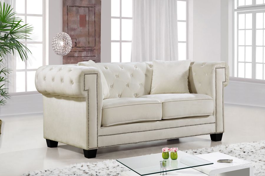 The appearance of Meridian Bowery Velvet Loveseat in Cream designed by Meridian in the modern / contemporary interior design. This cream velvet piece of furniture  was selected by 1StopBedrooms from Bowery Collection to add a touch of cosiness and style into your home. Sku: 614Cream-L. Material: Fabric. Product Type: Loveseat. Image1