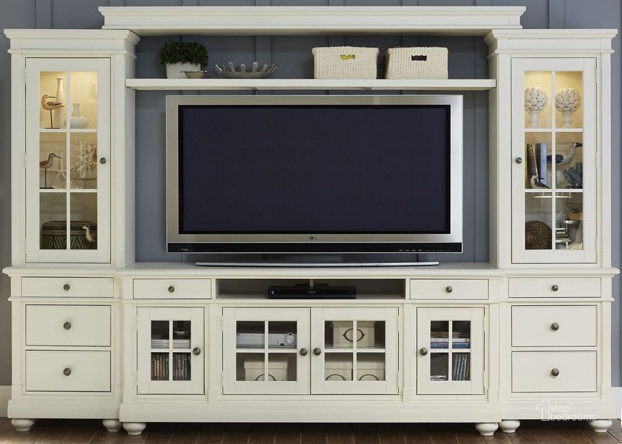 The appearance of Harbor View Linen Entertainment Wall Unit with 62 TV Console designed by Liberty in the transitional interior design. This white piece of furniture  was selected by 1StopBedrooms from Harbor Collection to add a touch of cosiness and style into your home. Sku: 631-EL00;631-ER00;631-LB60;631-TV62. Material: Wood. Product Type: Entertainment Wall.