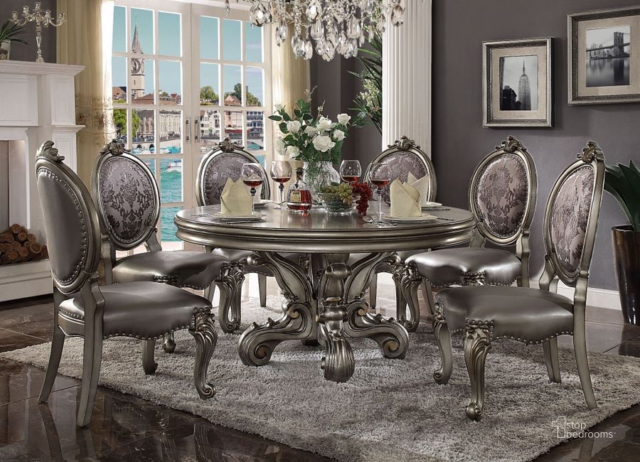 The appearance of Versailles Antique Platinum Round Pedestal Dining Room Set designed by ACME in the rustic / southwestern interior design. This silver piece of furniture  was selected by 1StopBedrooms from Versailles Collection to add a touch of cosiness and style into your home. Sku: 66840T;66841ST;66822. Table Top Shape: Round. Material: Wood. Product Type: Dining Room Set. Image1