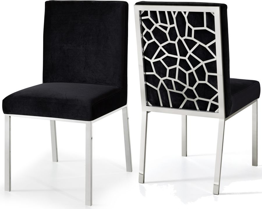 The appearance of Meridian Opal Velvet Dining Chair in Black (Set of 2) 736Black-C designed by Meridian in the modern / contemporary interior design. This black velvet piece of furniture  was selected by 1StopBedrooms from Opal Collection to add a touch of cosiness and style into your home. Sku: 736Black-C. Material: Fabric. Product Type: Dining Chair. Image1