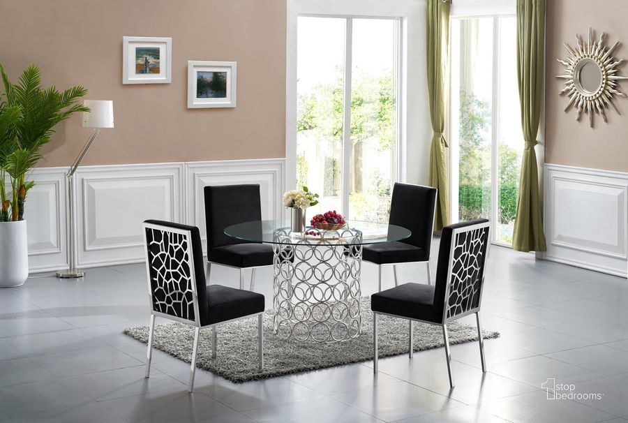 The appearance of Meridian Opal 5pcs Dining Room Set in Chrome designed by Meridian in the modern / contemporary interior design. This chrome piece of furniture  was selected by 1StopBedrooms from Opal Collection to add a touch of cosiness and style into your home. Sku: 736-T-1;736-T-2;736Navy-C. Table Base Style: Pedestal. Table Top Shape: Round. Product Type: Casual Dining Set. Material: Casual. Image1