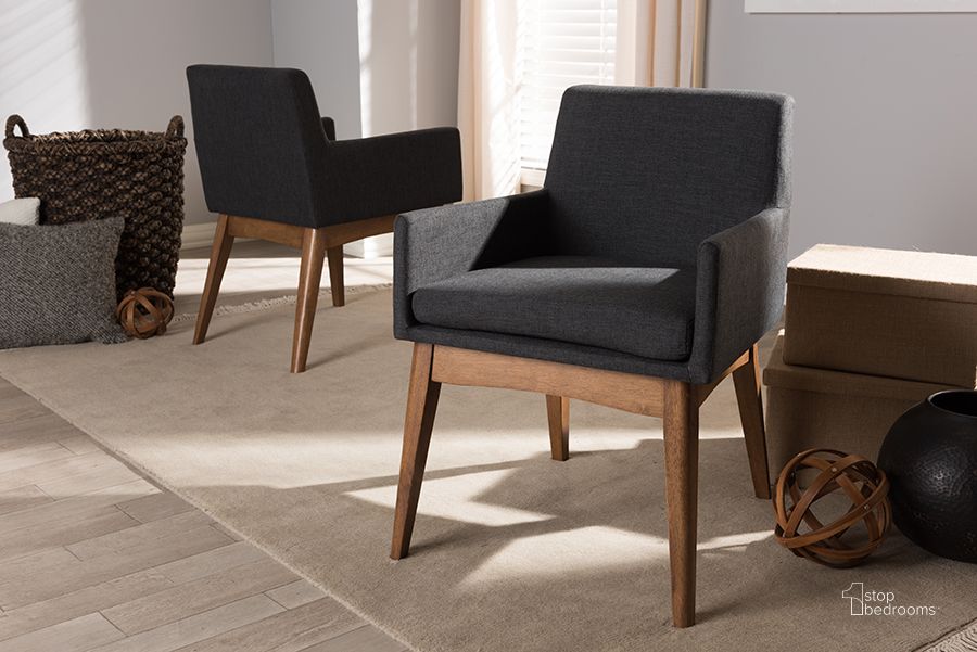 The appearance of Baxton Studio Nexus Mid-Century Modern Walnut Wood Finishing Dark Grey Fabric Dining Armchair (Set Of 2) designed by Baxton Studio in the transitional interior design. This dark grey piece of furniture  was selected by 1StopBedrooms from Nexus Collection to add a touch of cosiness and style into your home. Sku: BBT5281-Dark Grey-H1217-20. Material: Fabric. Product Type: Dining Chair. Image1
