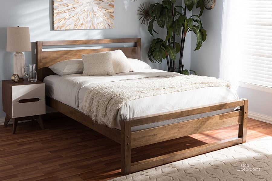 The appearance of Baxton Studio Torino Mid-Century Modern Solid Walnut Wood Open Frame Style King Size Platform Bed designed by Baxton Studio in the transitional interior design. This walnut piece of furniture  was selected by 1StopBedrooms from Torino Collection to add a touch of cosiness and style into your home. Sku: SW8068-Walnut-M17-King. Bed Type: Platform Bed. Product Type: Platform Bed. Bed Size: King. Material: Rubberwood. Image1