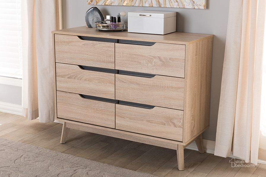 The appearance of Baxton Studio Fella Mid-Century Modern Two-Tone Oak And Grey Wood 6-Drawer Dresser designed by Baxton Studio in the transitional interior design. This light brown piece of furniture  was selected by 1StopBedrooms from Fella Collection to add a touch of cosiness and style into your home. Sku: FLDT00805-Hana Oak/Dark Grey-Dresser. Product Type: Dresser. Material: MDF. Image1
