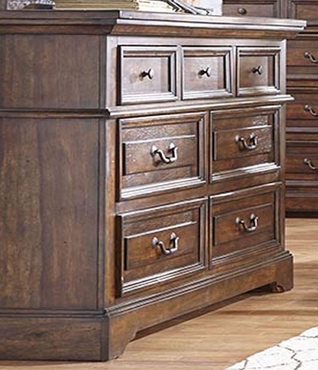 The appearance of Stonebrook Tobacco Dresser designed by American Woodcrafters in the traditional interior design. This brown piece of furniture  was selected by 1StopBedrooms from Stonebrook Collection to add a touch of cosiness and style into your home. Sku: 7800-270. Material: Wood. Product Type: Dresser. Image1