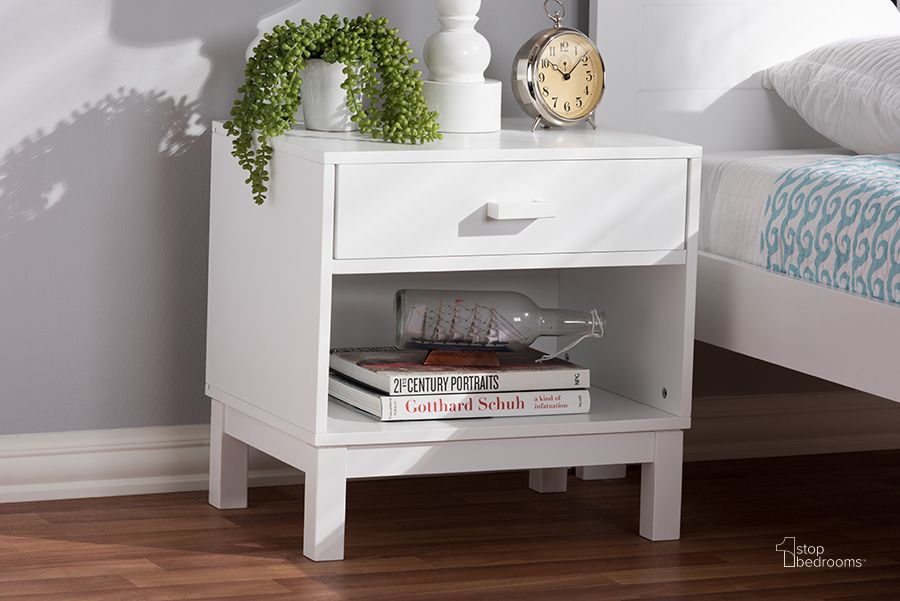 The appearance of Baxton Studio Deirdre Modern And Contemporary White Wood 1-Drawer Nightstand designed by Baxton Studio in the modern / contemporary interior design. This white piece of furniture  was selected by 1StopBedrooms from Deirdre Collection to add a touch of cosiness and style into your home. Sku: HNS01-White-NS. Product Type: Nightstand. Material: Rubberwood. Image1