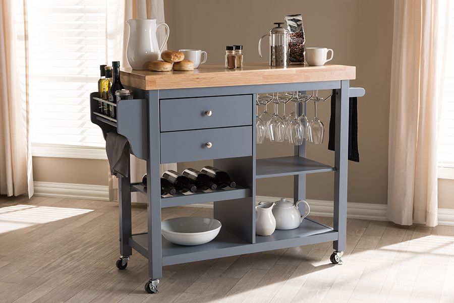 The appearance of Baxton Studio Sunderland Coastal And Farmhouse Grey Wood Kitchen Cart designed by Baxton Studio in the country / farmhouse interior design. This dark grey piece of furniture  was selected by 1StopBedrooms from Sunderland Collection to add a touch of cosiness and style into your home. Sku: RT515-OCC. Product Type: Kitchen Islands and Serving Cart. Material: Rubberwood. Image1