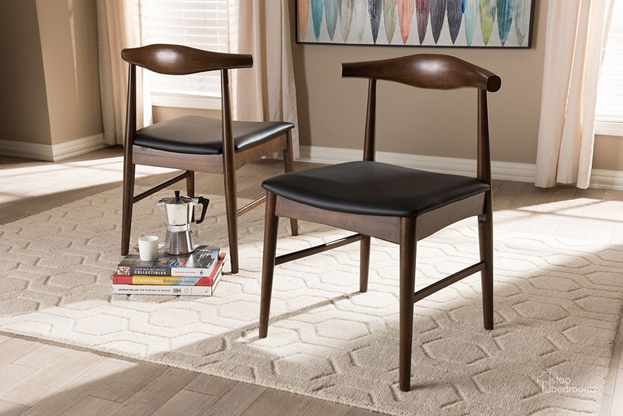 The appearance of Baxton Studio Winton Mid-Century Modern Walnut Wood Dining Chair (Set Of 2) designed by Baxton Studio in the transitional interior design. This black piece of furniture  was selected by 1StopBedrooms from Winton Collection to add a touch of cosiness and style into your home. Sku: RT514-CHR. Product Type: Dining Chair. Material: Rubberwood. Image1
